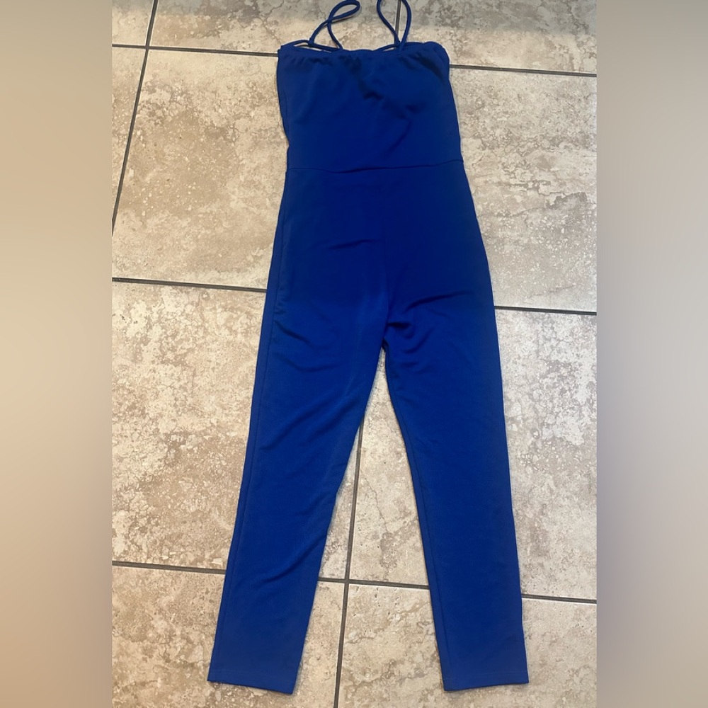 Royal Blue Jumpsuit with spaghetti straps and straight leg design.